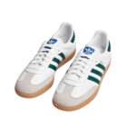 Color: White / Green Material: Premium Leather & Suede Fit: True to Size / Unisex Design: CDG x Adidas branding with OG Samba classic style Closure: Lace-Up Low Top Style: Streetwear / casual / limited-edition sneakers